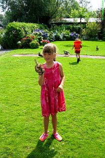 Girl plays with a boa 1 Girl plays with a boa 1