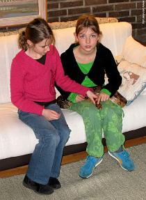 Two girls with a boa