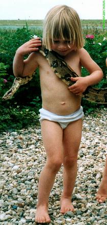 Toddler with boa Toddler with boa