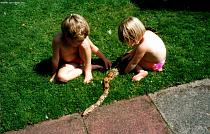 Children with boa Children with boa